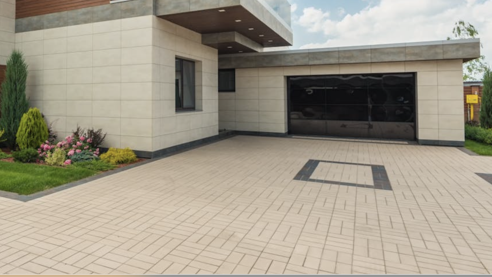 New concrete driveway installation in Huntsville, AL with broom finish