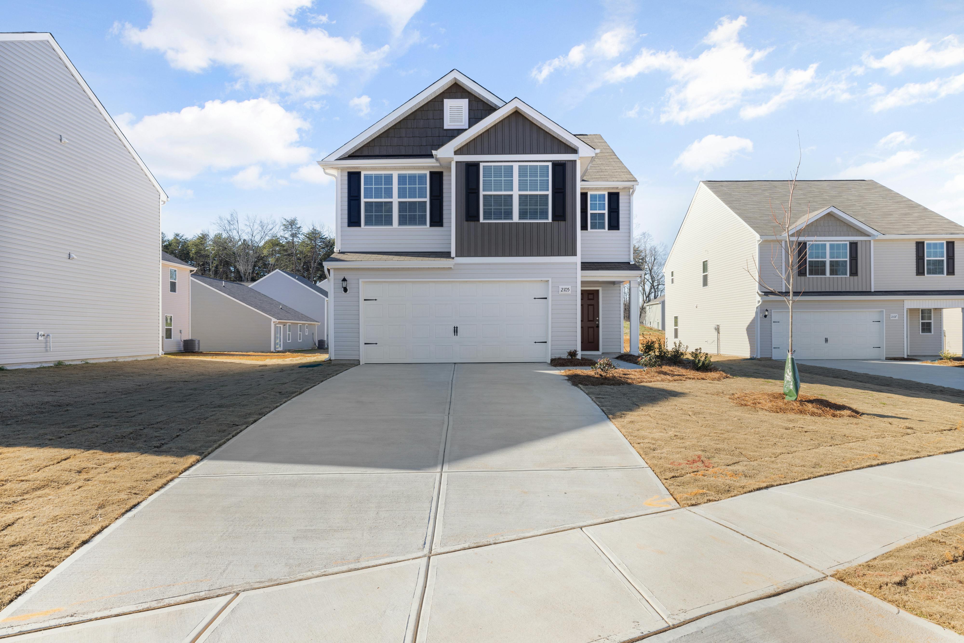 New concrete sidewalk installation in Huntsville, AL residential neighborhood